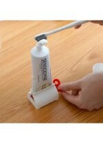 Anubhav Janni Rolling Tube Toothpaste Squeezer Seat Holder Stand Efficient Convenient Tool Easy Dispensing Storage Gels Face Wash Rotatable Dispenser Bathroom Kitchen Travel Use (Set Of 2 Pcs) - Image 2