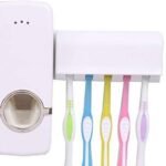 Anubhav Janni Toothpaste Dispenser White Hands Free Wall Mounted Plastic Dust Proof Automatic And Detachable Hole Toothbrush Holder And Dispenser Tooth Brush Bathroom Organizer (Pack Of 1 Pcs)